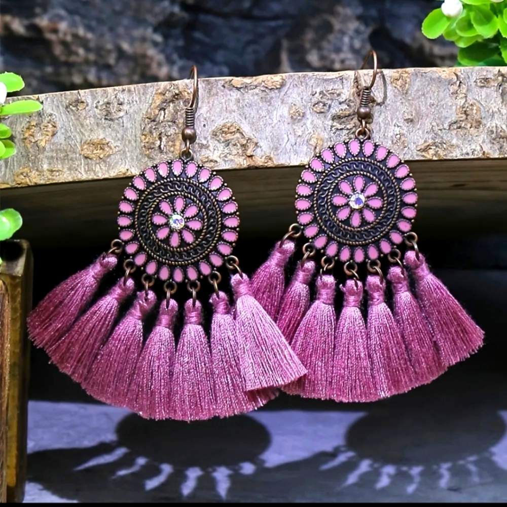 Dusty rose tassel earrings with a flower design
